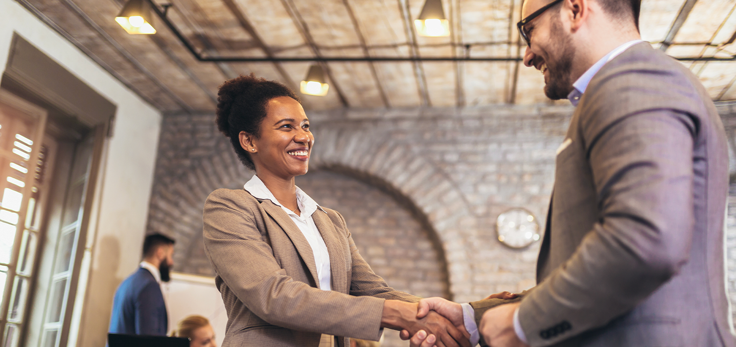 Two people shaking hands 