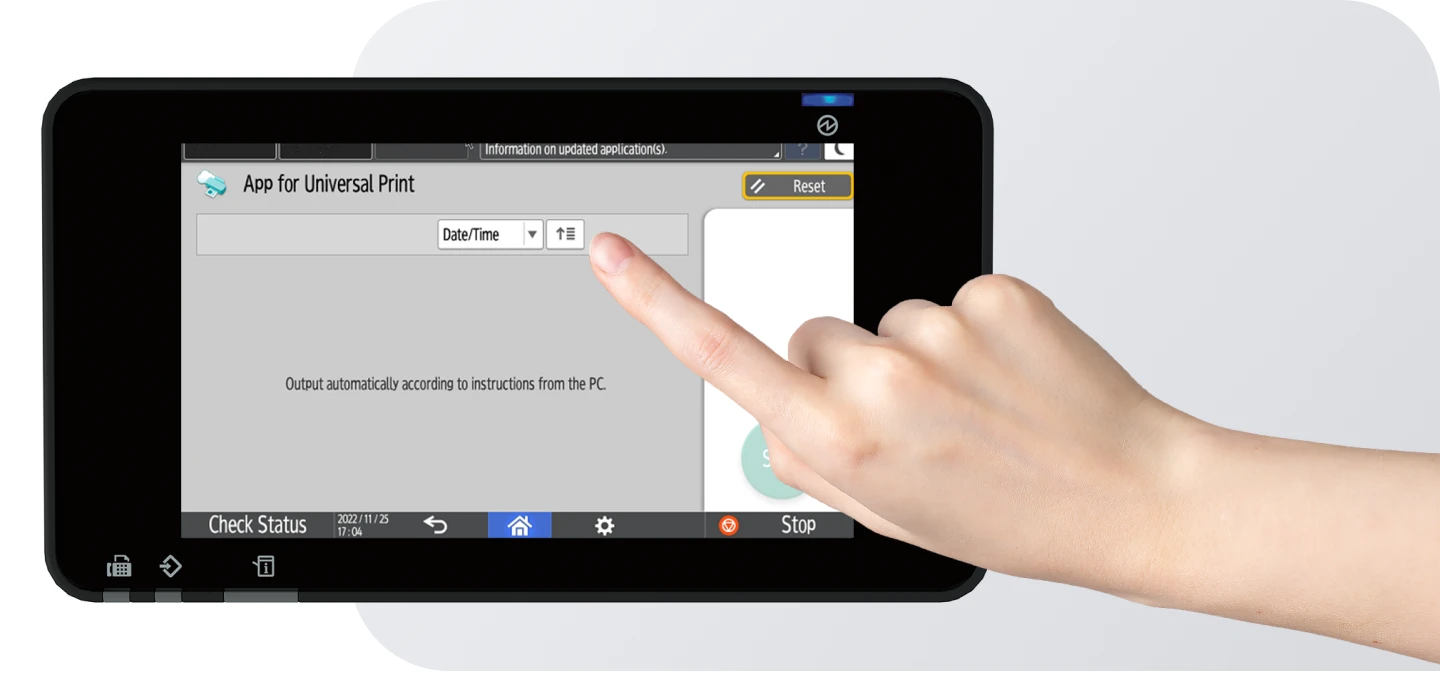 A hand with a pointer finger taps on a large black touch screen display, labeled "App for Universal Print," showing options for date/time and a "Reset" button. The screen also displays "Output automatically according to instructions from the PC." Below the main screen, there are icons for "Check Status," home, settings, and "Stop."